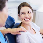 smiling woman in the dental treatment chair