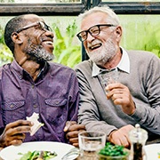 Dentures patient in Goode talking with a friend